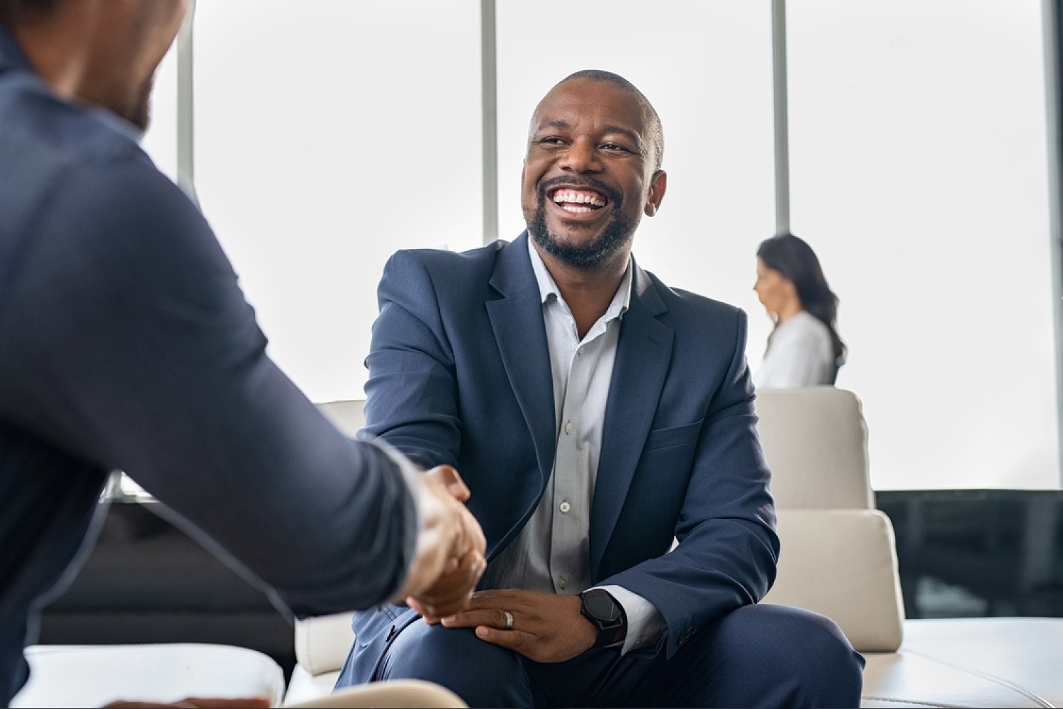 stock-photo-two-happy-mature-business-men-shaking-hands-in-office-successful-african-american-businessman-in-1671900805-transformed